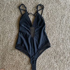 Iheartraves black bodysuit